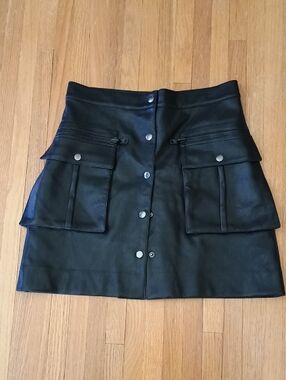 Black Vegan Leather Mini Skirt with Front Snap Closure and Utility Pockets